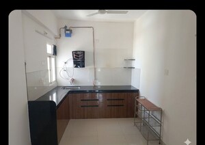 Kitchen in 2 BHK Apartment at Kumar Piccadilly, Wakad – for Rent
