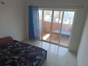 Bedroom in 2 BHK Apartment at Kumar Piccadilly, Wakad – for Rent