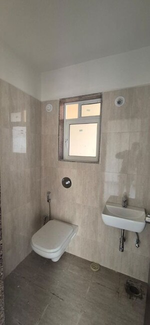 Bathroom in 1 BHK Apartment at Puranik Grand Central, Vartak Nagar – for Rent