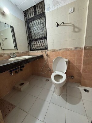 Bathroom in 3 BHK Apartment at Mapsko Krishna Apra Gardens, Vaibhav Khand – for Rent