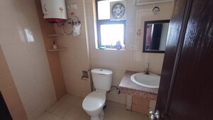 Bathroom in 2 BHK Apartment at Logix Blossom County, Sector 137 – for Rent
