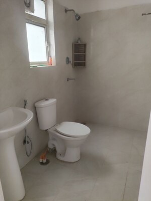 Bathroom in 3 BHK Builder Floor at Puri Aman Vilas, Sector 89 – for Sale