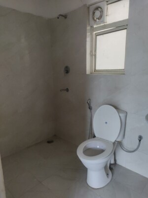 Bathroom in 3 BHK Builder Floor at Puri Aman Vilas, Sector 89 – for Sale