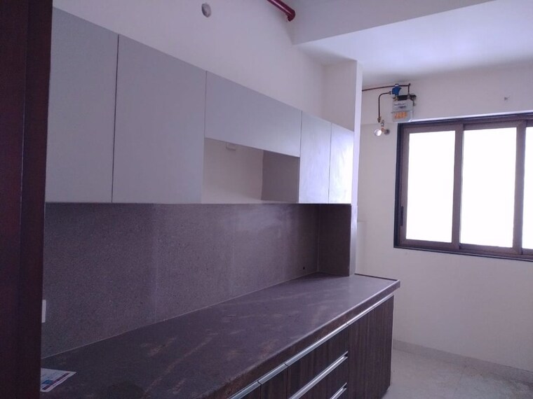 Kitchen, the-wadhwa-atmosphere 2.5 Bedroom 782 Sq.Ft. Apartment In Mulund West Mumbai 10409230