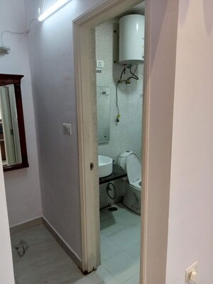 Bathroom in 2 BHK Apartment at Chandra Panorama, Sushant Golf City – for Rent