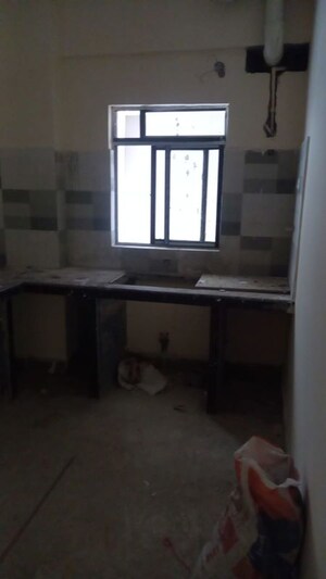 Kitchen in 4 BHK Apartment at Natural City Laketown, Lake Town – for Sale