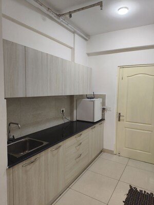 Kitchen in 1 RK Apartment at Wegmans Business Park, Knowledge Park 3 Greater Noida – for Rent