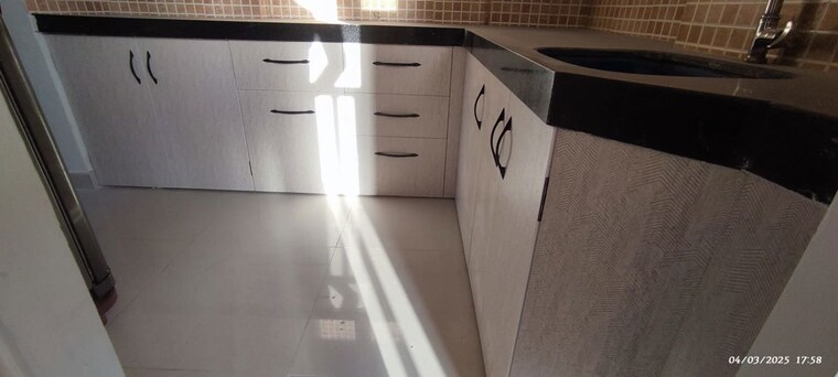 Kitchen, adani-shantigram-aangan 2 Bedroom 1350 Sq.Ft. Apartment In Near Vaishno Devi Circle On Sg Highway Ahmedabad 10409352