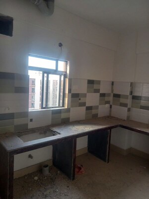 Kitchen in 4 BHK Apartment at Natural City Laketown, Lake Town – for Rent