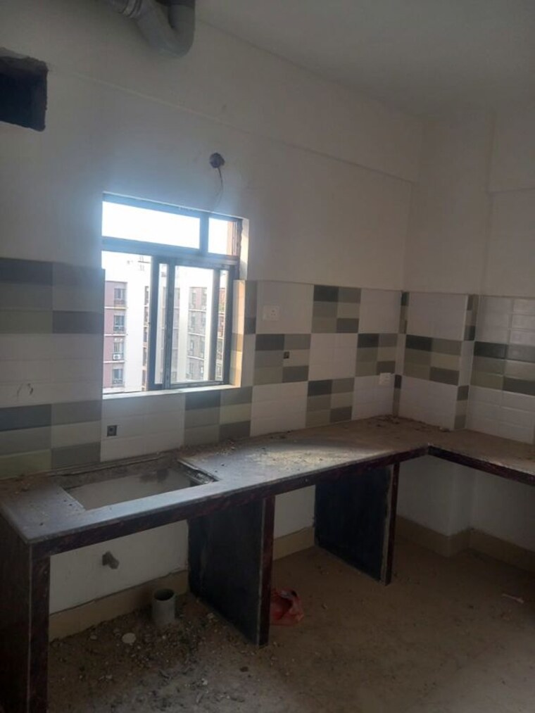 Kitchen, natural-city-laketown 4 Bedroom 1250 Sq.Ft. Apartment In Lake Town Kolkata 10409361