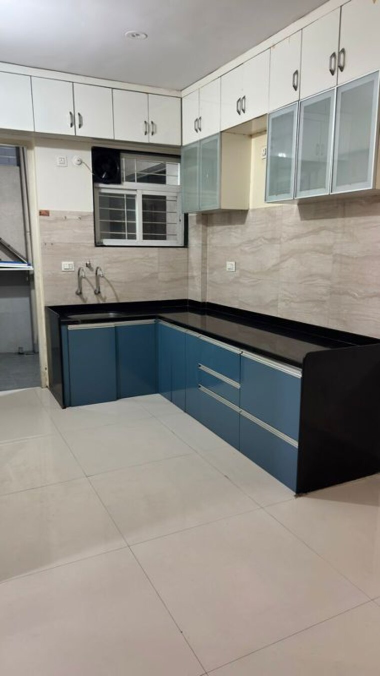Kitchen, sukhwani-celaeno 2.5 Bedroom 800 Sq.Ft. Apartment In Pimple Saudagar Pune 10409394
