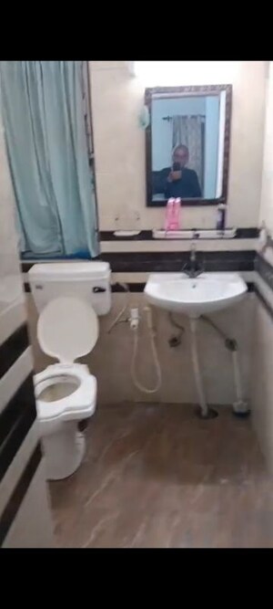 Bathroom in 2 BHK Apartment at Arun Vihar – for Sale
