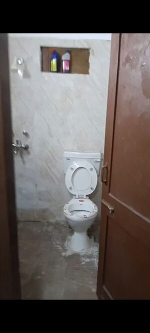 Bathroom in 2 BHK Apartment at Arun Vihar – for Sale