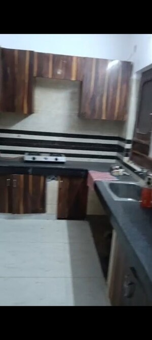 Kitchen in 2 BHK Apartment at Arun Vihar – for Sale