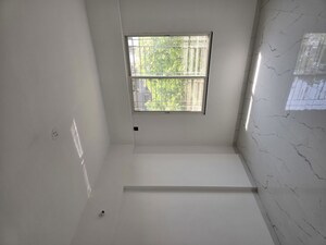 Room in 2 BHK Apartment at Keystone Oxy Eterno, Dhanori – for Rent