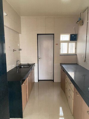 Kitchen in 2 BHK Apartment at Palash FGH, Wakad – for Rent