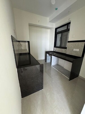 Kitchen in 3 BHK Apartment at Courtyard by Narang Realty and The Wadhwa Group, Pokhran Road No Two – for Rent
