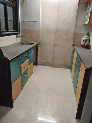 Kitchen in 2 BHK Apartment at Jai Surya Complex, Dombivli West – for Rent