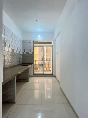 Building Lobby in 1 BHK Apartment at Deeplaxmi Shreeji Meadows, Katrap – for Sale