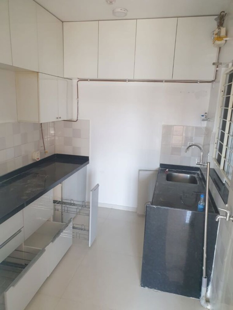 Kitchen, ganga-legend 2 Bedroom 1000 Sq.Ft. Apartment In Bavdhan Pune 10409644
