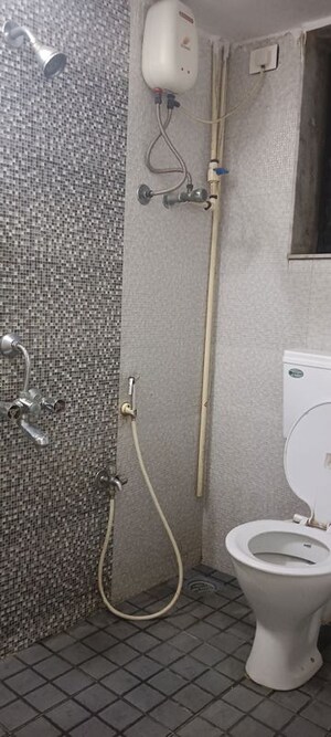 Bathroom in 2 BHK Apartment at Jawaharban CHS, Andheri West – for Rent