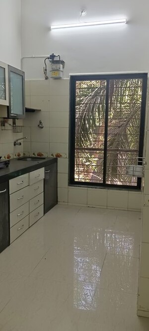 Kitchen in 2 BHK Apartment at Jawaharban CHS, Andheri West – for Rent