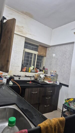 Kitchen in 2 BHK Apartment at Celebration Apartment, Balewadi – for Rent