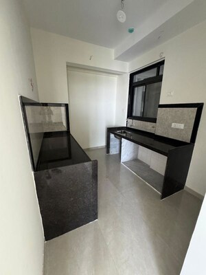 Kitchen in 3 BHK Apartment at Courtyard by Narang Realty and The Wadhwa Group, Pokhran Road No Two – for Rent