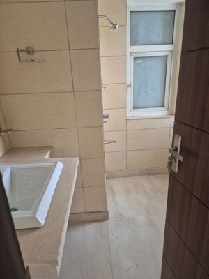 Bathroom in 4 BHK Apartment at Puri Diplomatic Greens Phase I, Sector 111 – for Rent