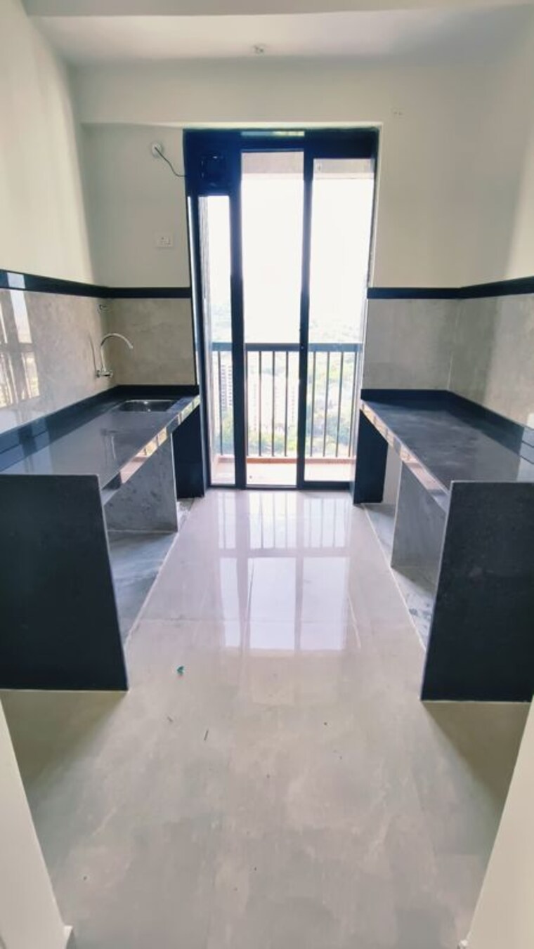Kitchen, kalpataru-immensa-b 2 Bedroom 761 Sq.Ft. Apartment In Kolshet Road Thane 10409779
