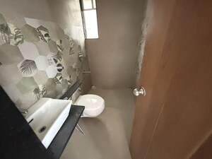 Bathroom in 3 BHK Apartment at Welworth Purnam, Hinjewadi – for Rent