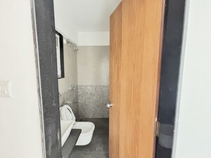 Bathroom in 3 BHK Apartment at Welworth Purnam, Hinjewadi – for Rent