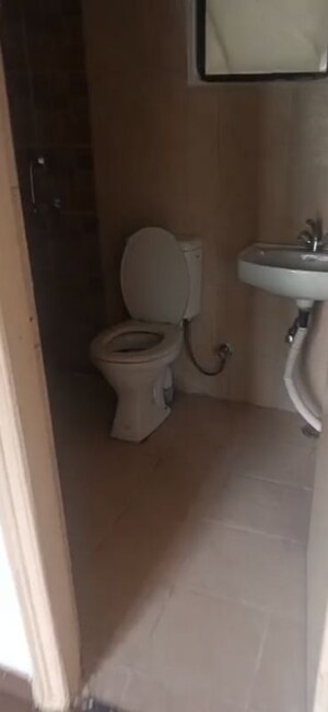 Bathroom in 2.5 BHK Apartment at SG Impressions 58, Raj Nagar Extension – for Sale