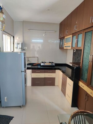 Kitchen in 3 BHK Apartment at Dwarkadheesh Residency, Pimple Saudagar – for Rent