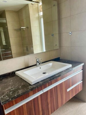 Bathroom in 3 BHK Apartment at Mahindra Luminare, Sector 59 – for Rent
