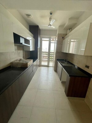 Kitchen in 3 BHK Apartment at Mahindra Luminare, Sector 59 – for Rent