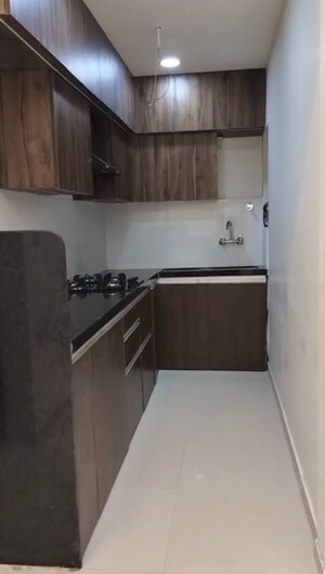 Kitchen in 3 BHK Apartment at Gera World of Joy, Kharadi – for Rent
