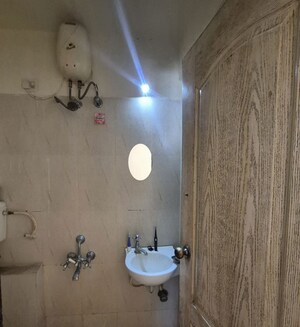 Bathroom in 3 BHK Apartment at Rutuparna Apartments, Baner – for Rent