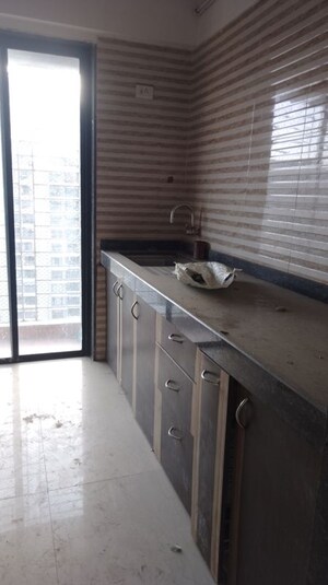 Kitchen in 1 BHK Apartment at Tharwani Vedant Millenia, Titwala – for Rent