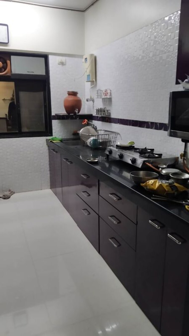 Kitchen, amar-sahajeevan-chsl 3 Bedroom 950 Sq.Ft. Apartment In Borivali West Mumbai 10410118
