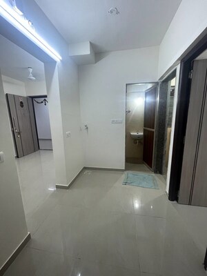 Building Lobby in 1 BHK Apartment at Satellite Garden, Goregaon East – for Rent