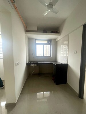 Building Lobby in 1 BHK Apartment at Satellite Garden, Goregaon East – for Rent