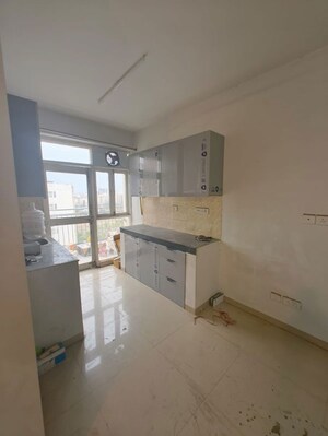 Kitchen in 2 BHK Apartment at Adani Aangan, Sector 89a – for Rent