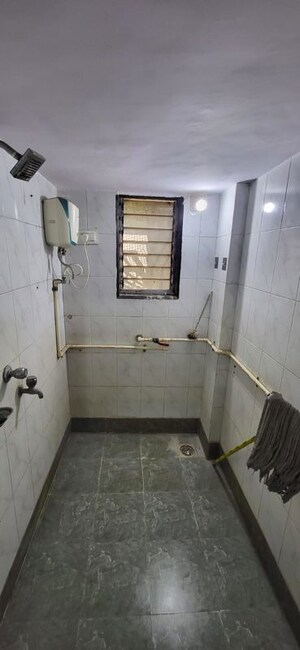 Bathroom in 1 BHK Apartment at Anand Jyoti CHS, Dombivli West – for Rent