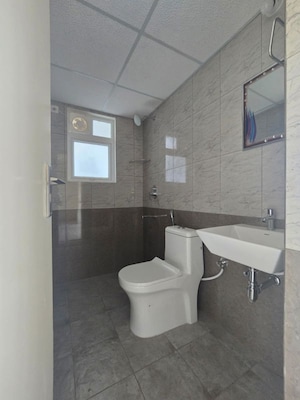 Bathroom in 3 BHK Apartment at Salarpuria Sattva Bliss, Budigere Cross – for Rent