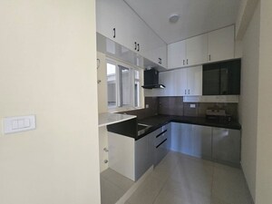 Kitchen in 3 BHK Apartment at Salarpuria Sattva Bliss, Budigere Cross – for Rent
