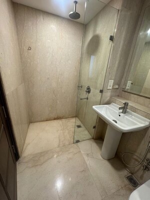 Bathroom in 5 BHK Apartment at Ambience Caitriona, Sector 24 – for Rent