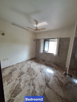 Room in 2 BHK Apartment at Pleasant Park CHS, Dahisar West – for Sale