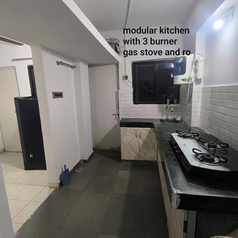 Kitchen, satellite 2 Bedroom 350 Sq.Ft. Apartment In Satellite Ahmedabad 10410352