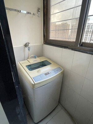 Bathroom in 1 BHK Apartment at Haware Dahlia, Kasarvadavali – for Rent